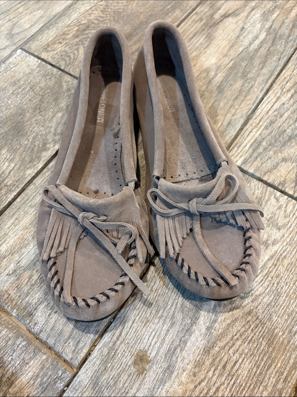 Minnetonka Kilty hardsole gray moccasins Women’s size 11